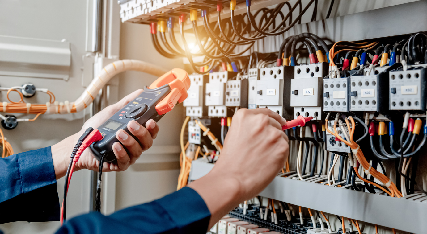 Electrician Fixing an Electrical Lines